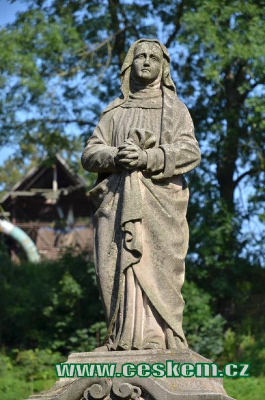 Detail sochy Panny Marie.